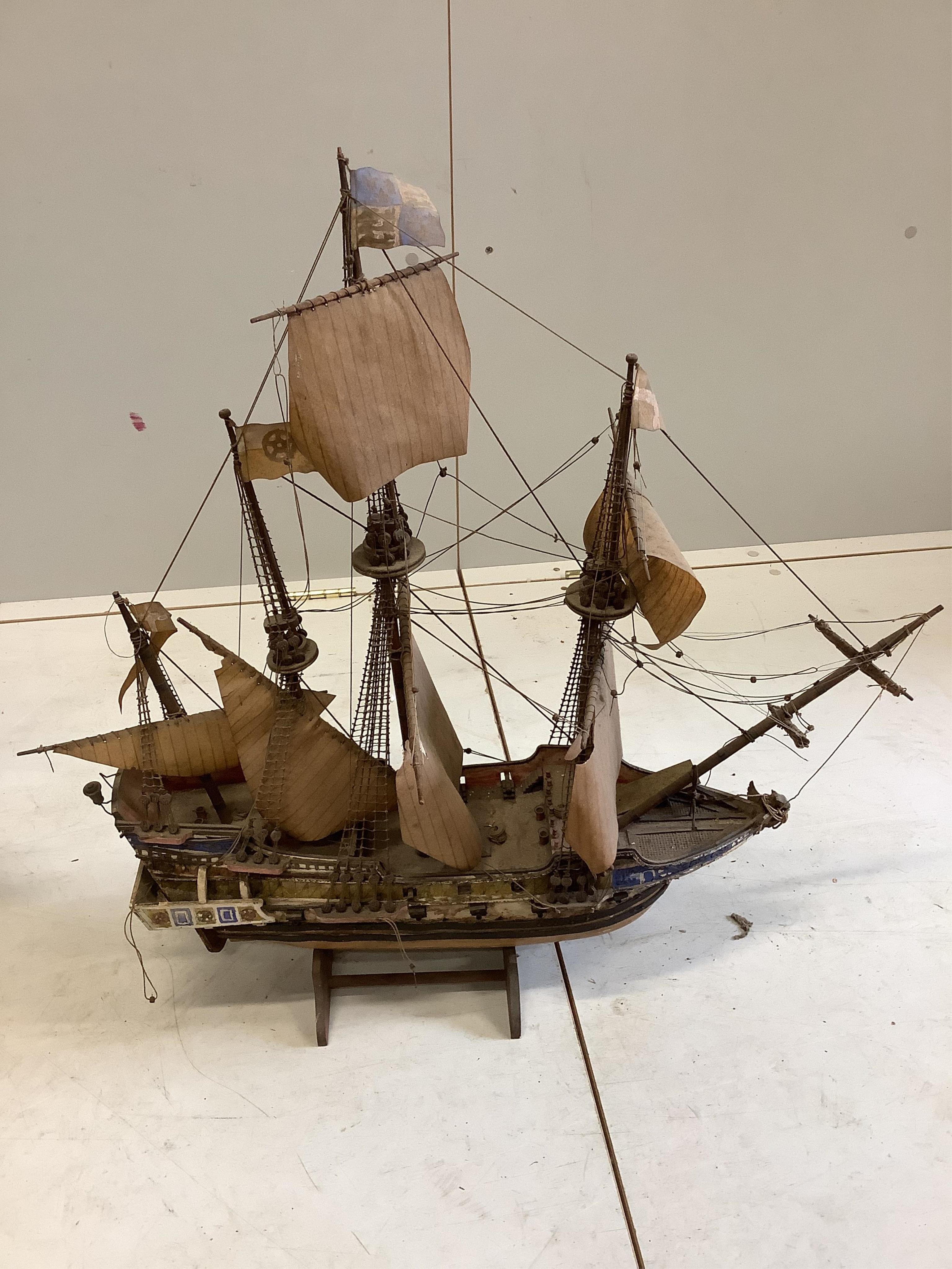A kit built model of HMS Victory with booklet, length 75cm, together with one other model boat. Condition - fair